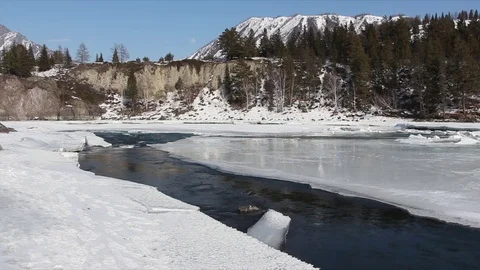 Confluence of melting rivers in the early spring,  Altai, Russia Stock Footage 79252687