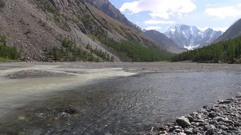 Confluence of two mountain rivers. The Meeting of Waters Stockbeeldmateriaal 84039793