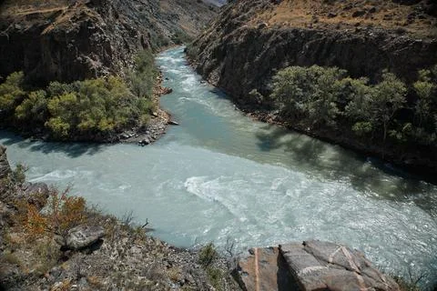 Confluence of two rivers of different colors Stock Photos