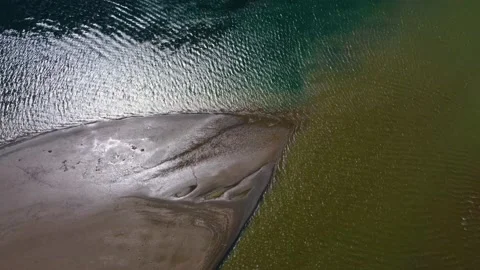Confluence of two rivers in Georgia,Batumi.Sun reflection on river water 스톡 동영상 229780767
