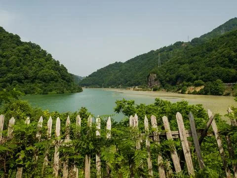 The confluence of two rivers in the mountains Foto stock