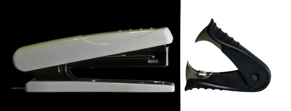 Confrontation stapler vs antistapler Stock Photos