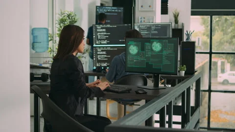 Confused asian engineer having it system hacked on computer Stock Footage 231450044