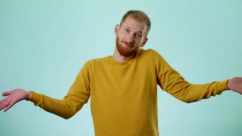 Confused Bearded Handsome Unsure Guy Looking At Camera And Shrugs His Arms, Stock Footage 170191541