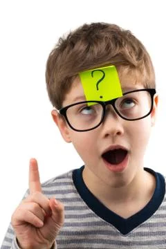 Confused boy thinking with question mark on sticky note on forehead Stock Photos