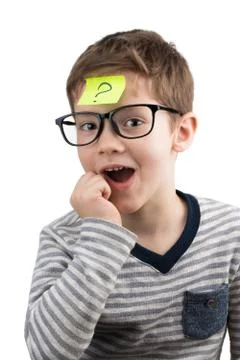 Confused boy thinking with question mark on sticky note on forehead Stock Photos