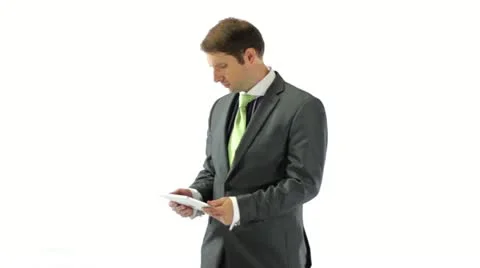 Confused Businessman Using a Tablet Stock Footage 11825069