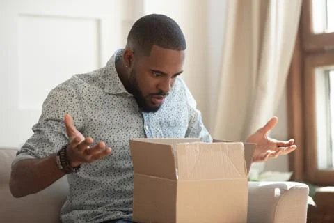 Confused client received wrong or damaged item. Stock Photos