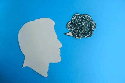 Confused Communication Speech Bubble Next to Human Head Silhouette Stock Photos
