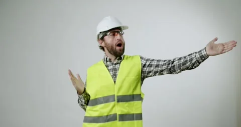 Confused Construction Worker Shrugging Shoulders, Unsure of the Answer Stock Footage 317966579