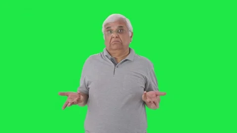 Confused Indian old man asking what question Green screen Stock Footage 280381978