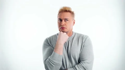 Confused man having doubt, thinking over choice, imagining plan, idea Video stock 239465584