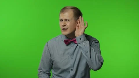 Confused man having hearing problems, asking say louder, difficult to listen Stock Photos
