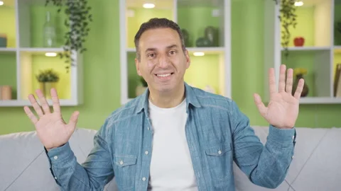 Confused man looking at camera in amazement, listening, good news. Stock Footage 236147215