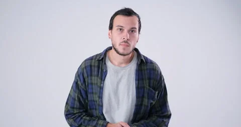 Confused Man looking in camera Stockbeeldmateriaal 143942501