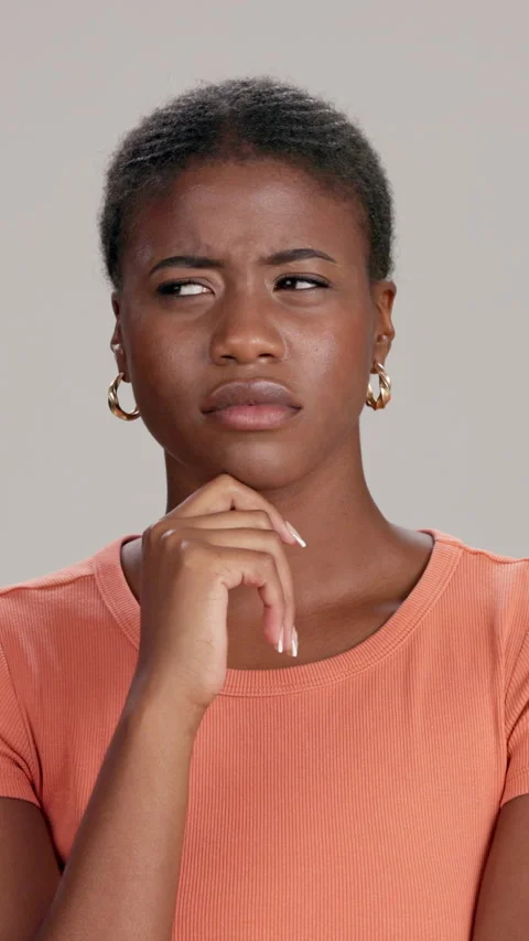 Confused, problem solving and thinking with black woman in studio for planning Stock Footage 295743889