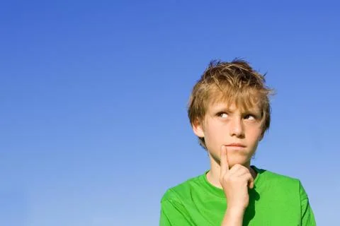 Confused puzzled child thinking Stock Photos