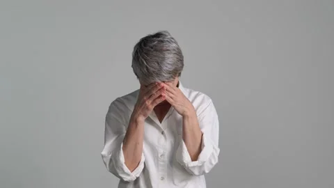 Confused puzzled upset middle aged Asian woman Видео 159845633