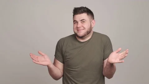 Confused puzzled young man throwing up hands in shame Stock Footage 161139522