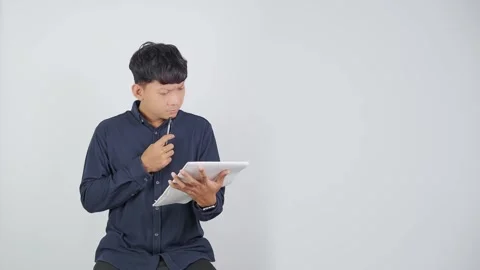 Confused Student Struggling to Understand Lesson Vídeo Stock 344830492