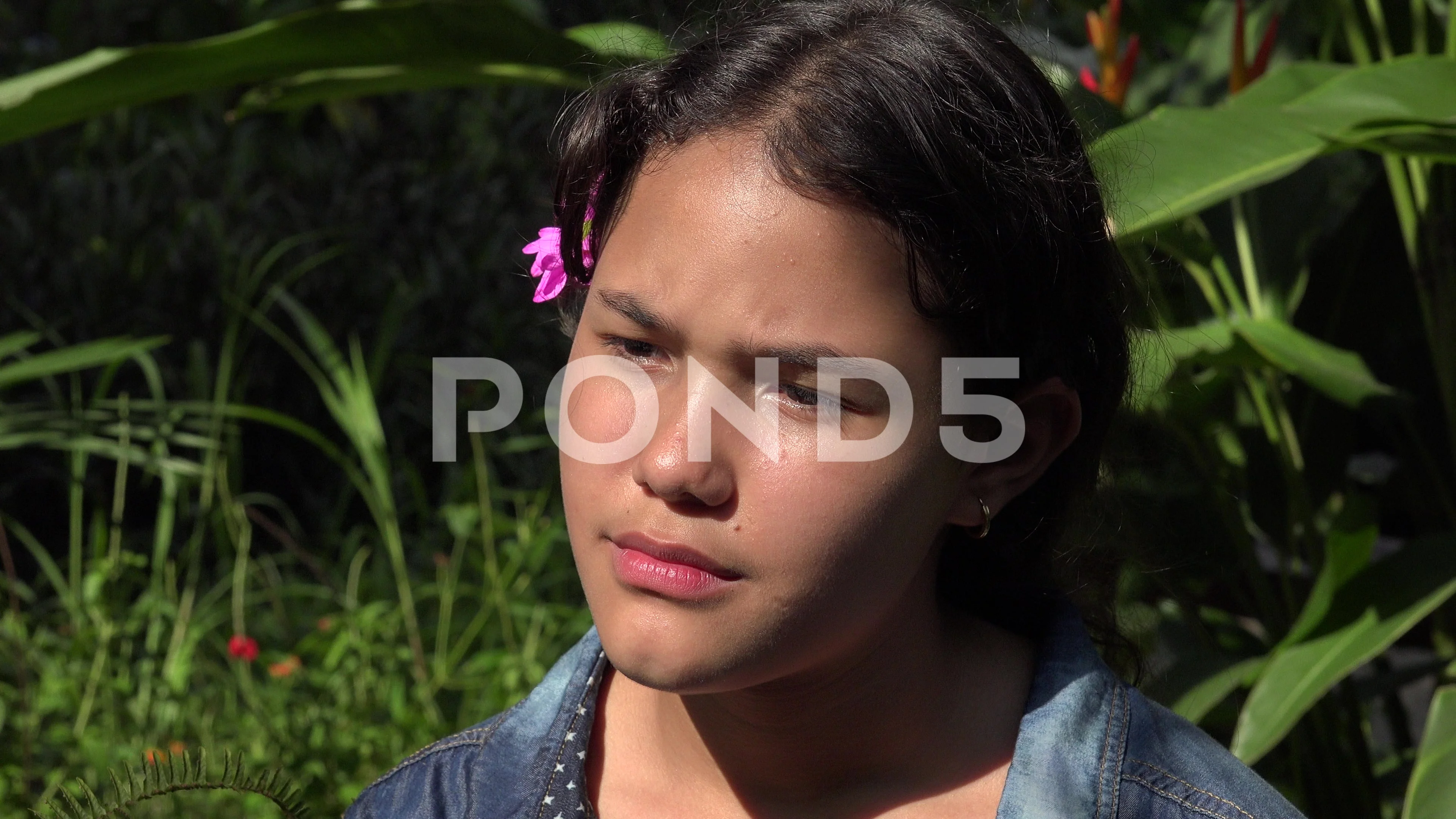 Confused Teen Hispanic Girl in Nature | Stock Video | Pond5