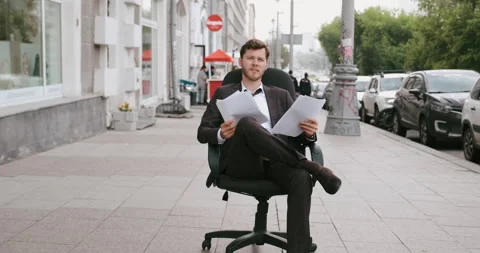 Confused tired office worker manager among the street in city quit his job Stock Footage 218626451