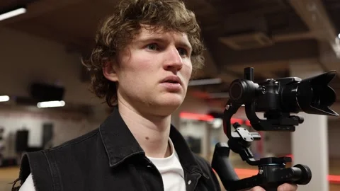 Confused videographer during filming Stock Footage 332902296