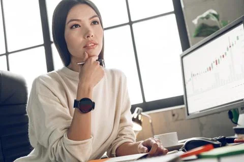 Confusion analyst, trader, marketer or advertiser working in the office Stock Photos