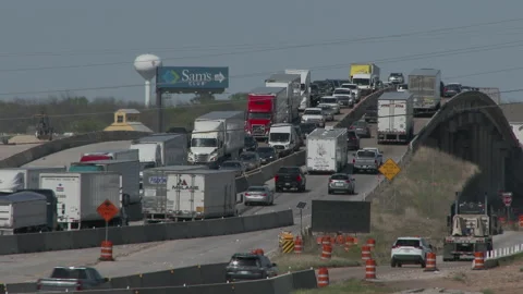Congested Interstate traffic at an exit ramp and overpass, 4K. Stock Footage 151595294