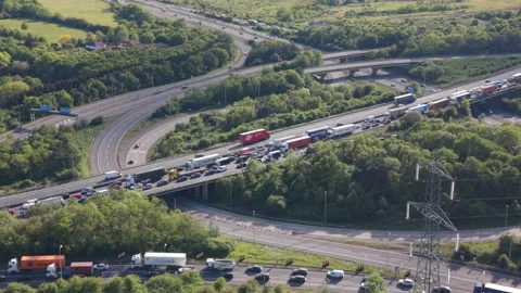 Congested Motorway Junction Aerial View With Many Trucks and Cars Stock Footage 335351941