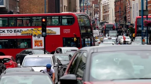 Congested rush-hour traffic Putney High Street  London Video stock 105111687
