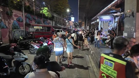 Congested traffic on Sukhumvit Road in Bangkok, Thailand during the evening of Stock Footage 337127362