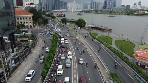 Congested traffic of vehicles in HCMC Saigon, Vietnam 4K Stock Footage 254051977