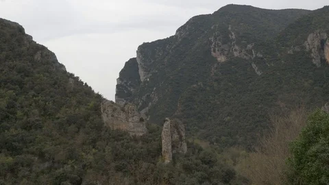 Congost Mont-rebei mountains trees sky vertical high cloudy europe Stock Footage 112935927