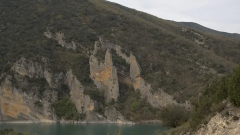 Congost Mont-rebei vertical mountains lake sky trees stone piedra Stock Footage 112943773