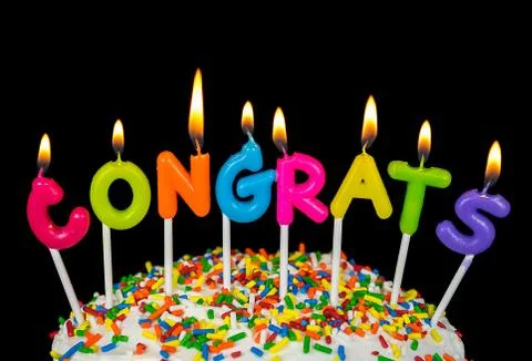 Congrats candle on cake Stock Photos