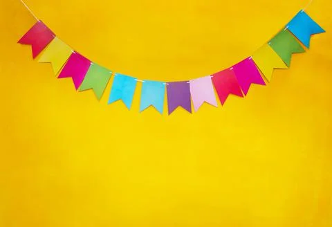 Congratulation flags on yellow background Stock Photos
