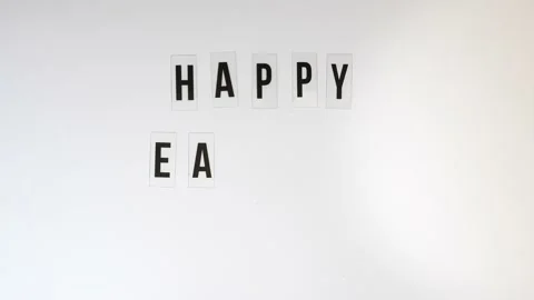Congratulation with Happy Easter and bunny silhouettes appear on white Stock Footage 172453689