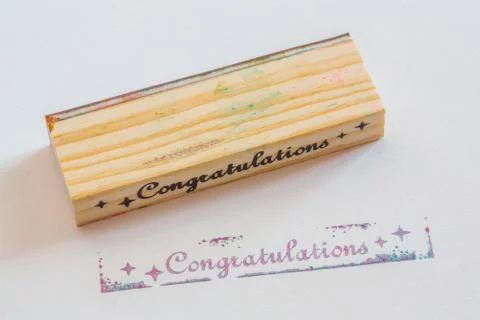 Congratulation stamped on paper Stock Photos