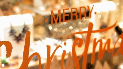 Congratulations Merry Christmas on a window pane. Christmas gifts for the window Video stock 69866057
