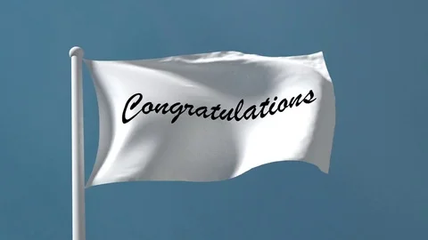 Congratulations written on a white flag blowing in the wind Stock Footage 75429398