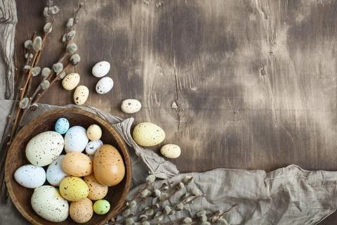 Congratulatory easter background. Easter eggs and flowers. Selective focus. Top Stock Photos