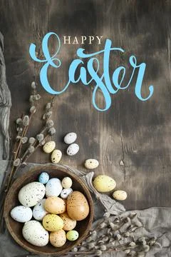 Congratulatory easter background. Easter eggs and flowers. Selective focus. Top Foto stock