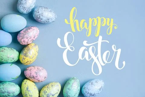 Congratulatory easter background. Easter eggs and flowers. Selective focus. Top Foto stock