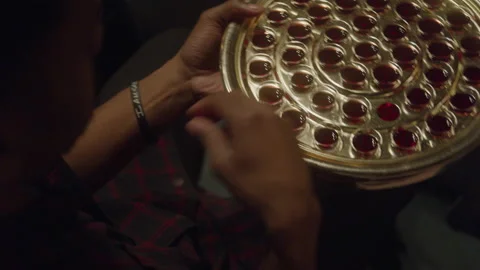 Congregant Taking a Cup of Communion Wine From a Plate Stockbeeldmateriaal 208802131