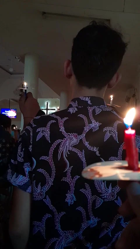 Congregation holding Christmas candles during Christmas Eve Stock Footage 296613129