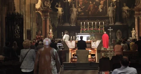 Congregation at organ mass in St. Stephen’s Cathedral, Vienna Stock Footage 321031318