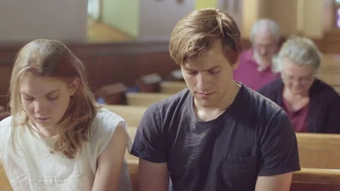 Congregation praying in church Stock Footage 133095744