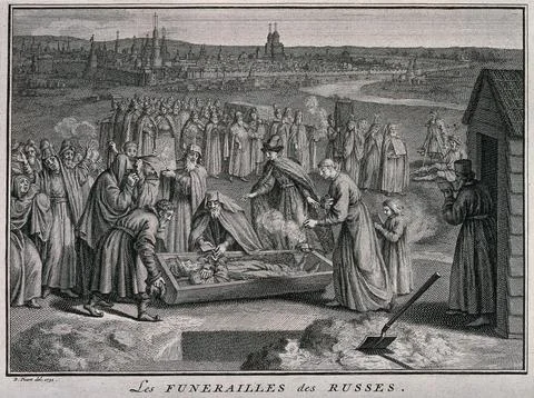 A congregation of Russian mourners preparing a corpse for burial. Engraving.. Stock Illustration