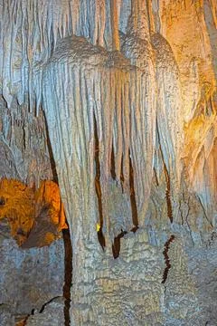 Conical Columns Deep Within a Cave Stockfoto's